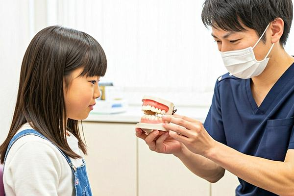 Dental professional discussing orthodontic treatment with a patient during a consultation.
